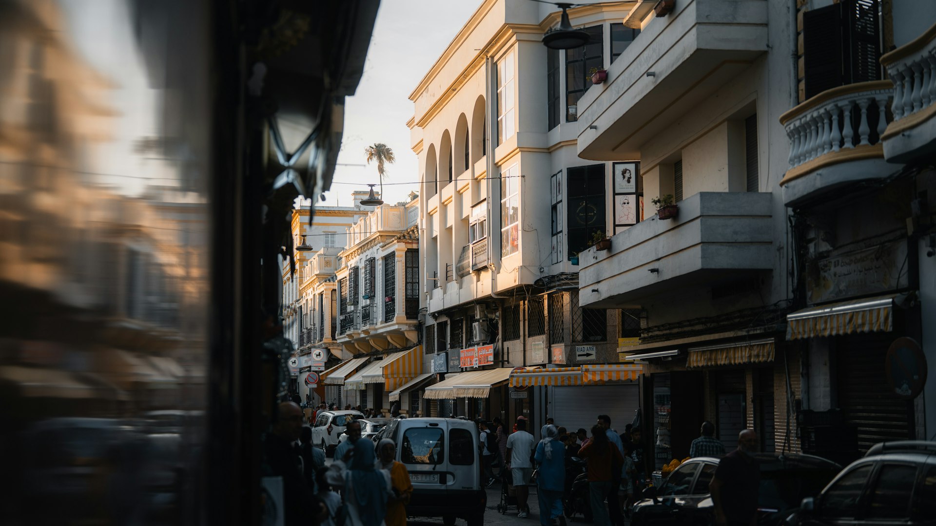 Street scene in an old city during golden hour.